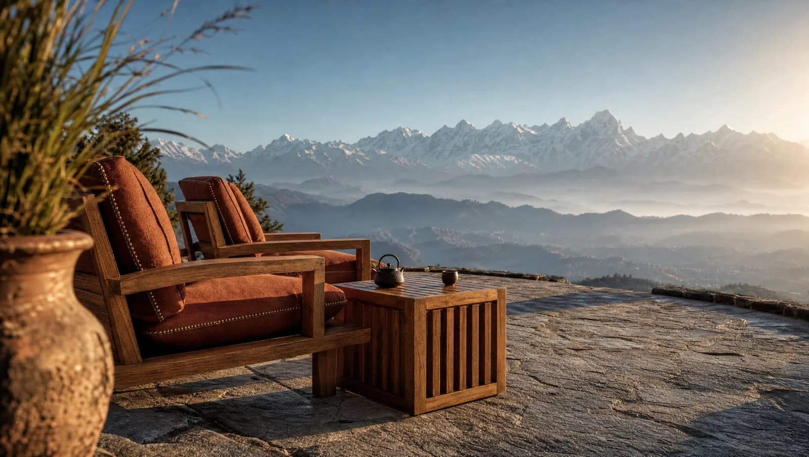 GNS Store teak outdoor lounge furniture on a terrace with a Himalayan backdrop